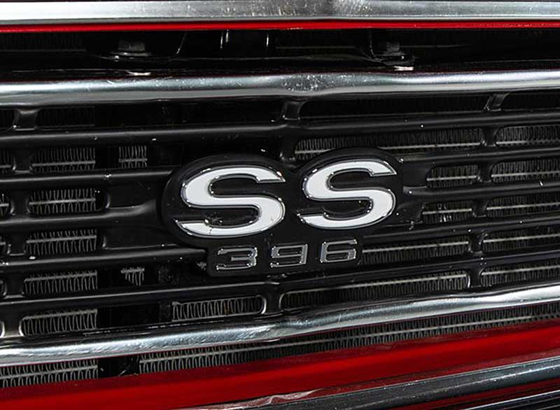 Close-up of the SS 396 badge and front grille of a 1966 Chevelle